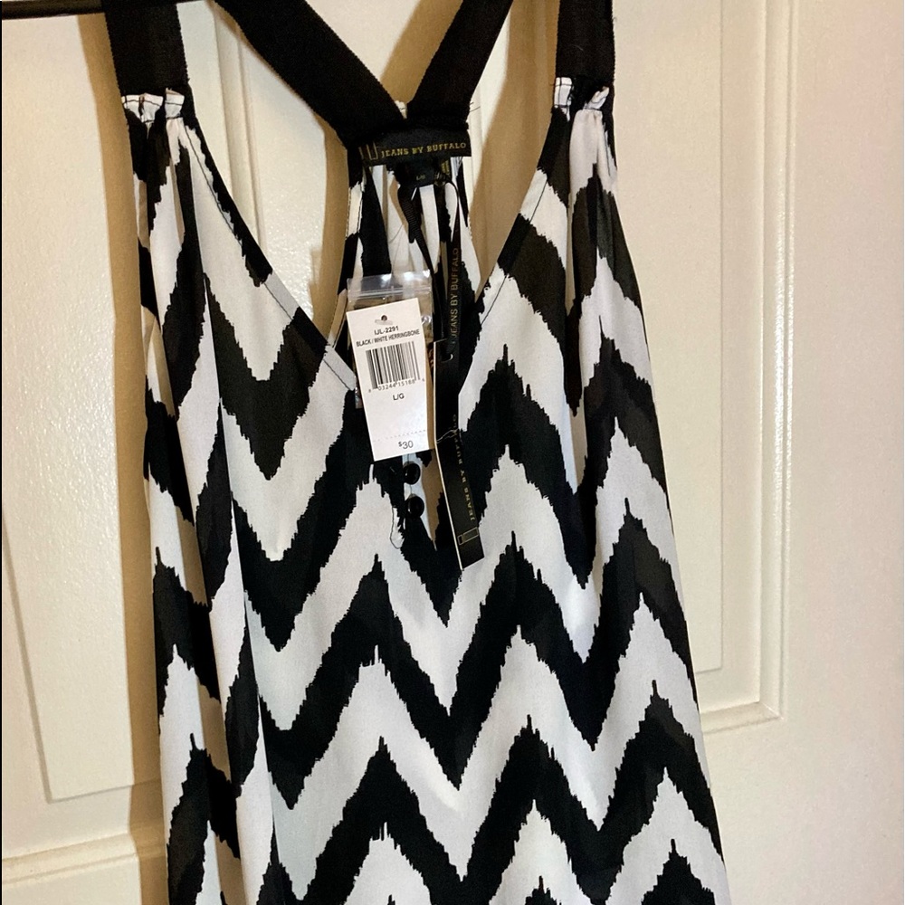 I Jeans by Buffalo. Sheer black and white zebra tank top with cute back detail.